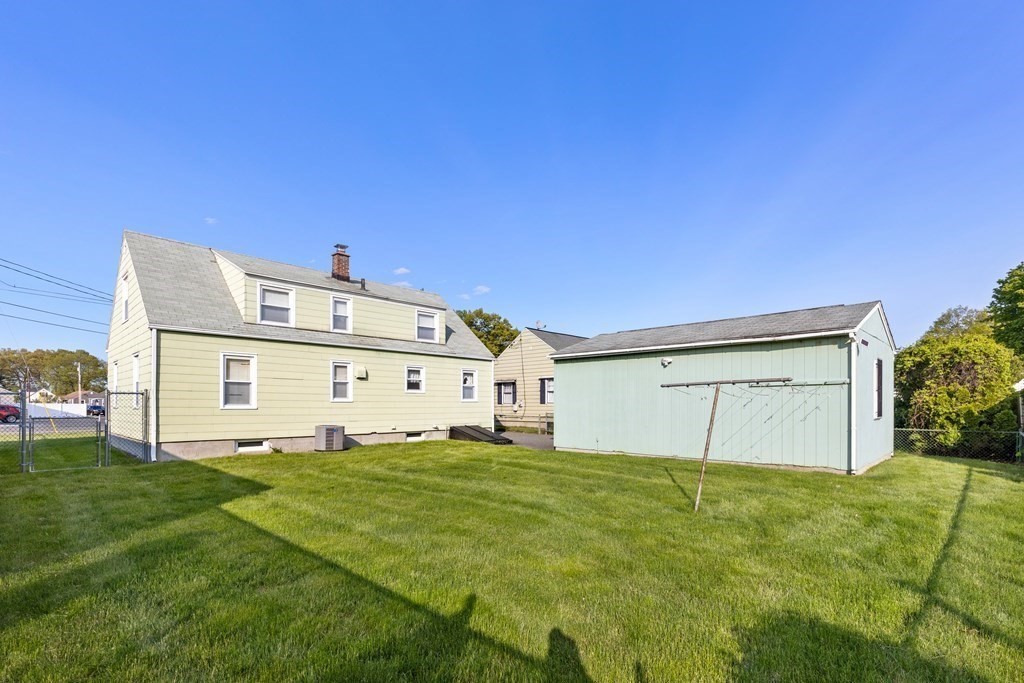 3 East Street Springfield, MA 01104 - Photo 28 of 29 a front view of a house with a yard