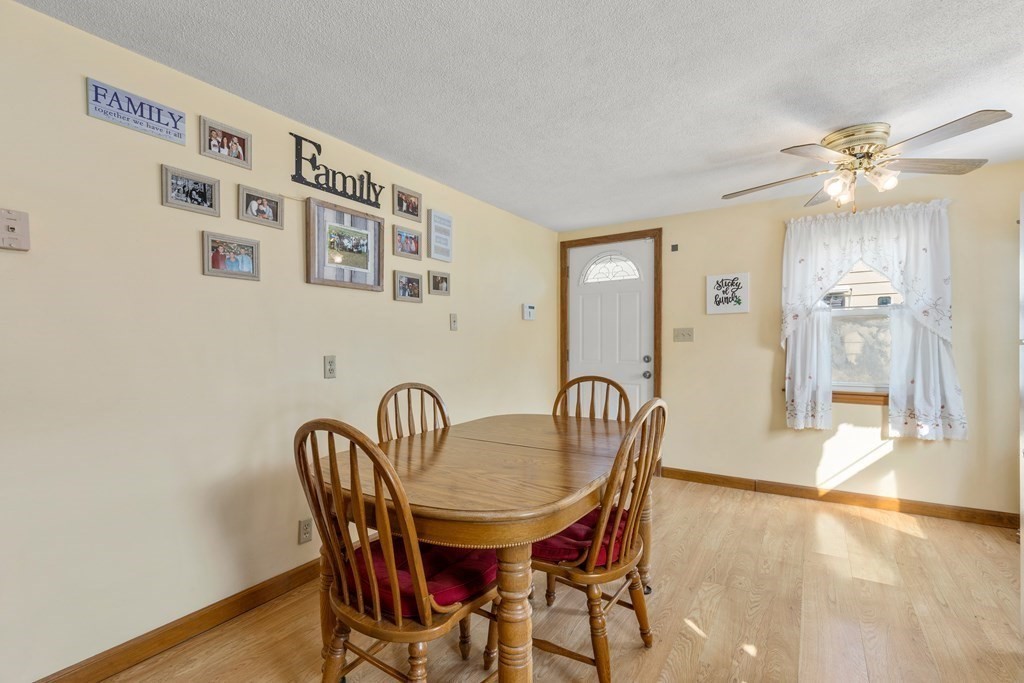 3 East Street Springfield, MA 01104 - Photo 5 of 29 a view of a dining room with furniture and wooden floor