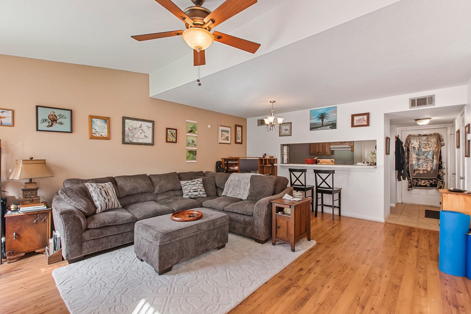 6029 Old Fredericksburg Road, Unit A Austin, TX 78749 - Photo 16 of 20 a living room with furniture and wooden floor