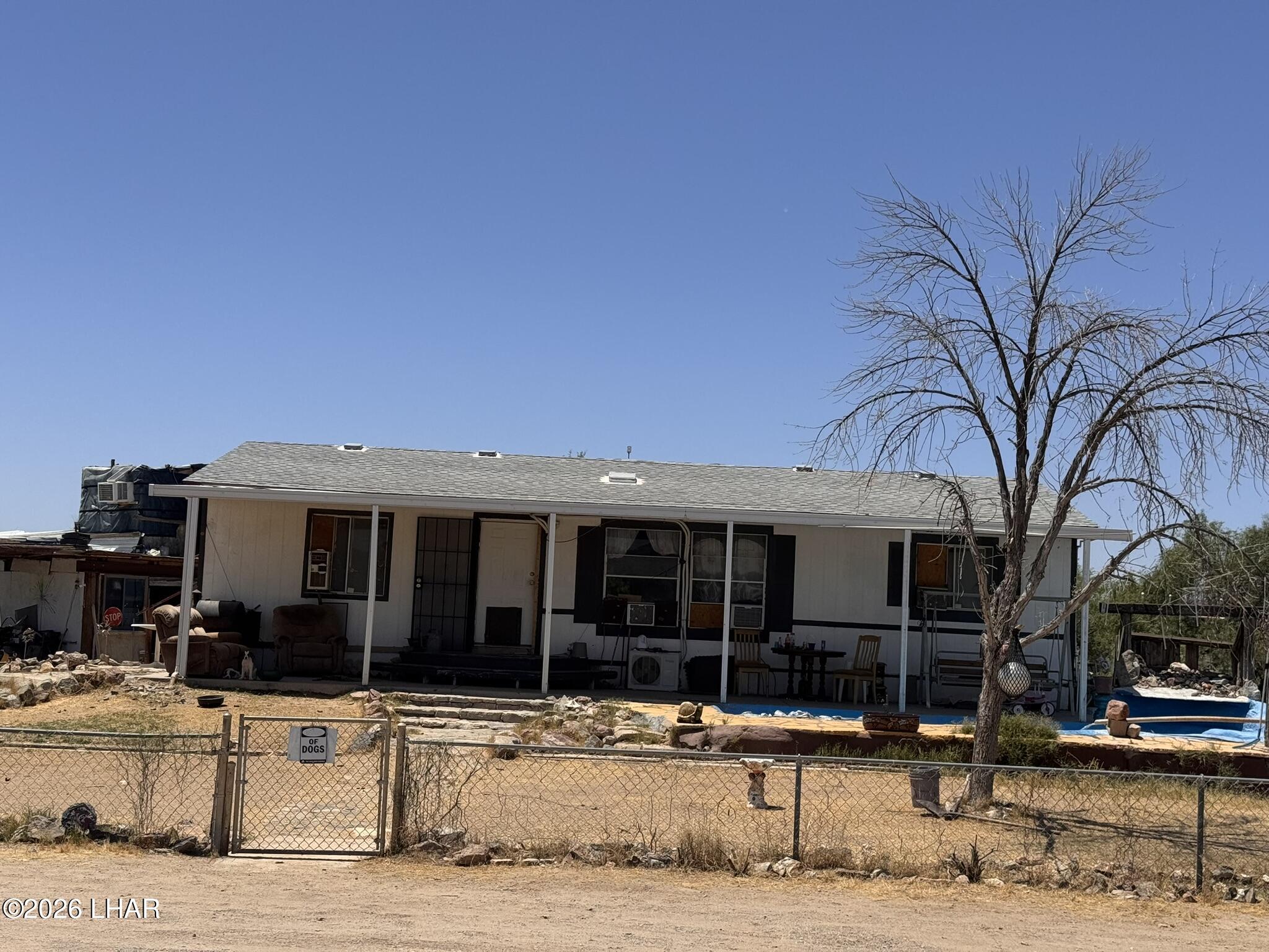 69896 Salome Road Salome, AZ 85348 - Photo 17 of 19 a view of a house with a patio