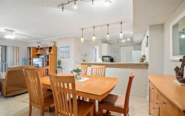 a view of a dining room with furniture