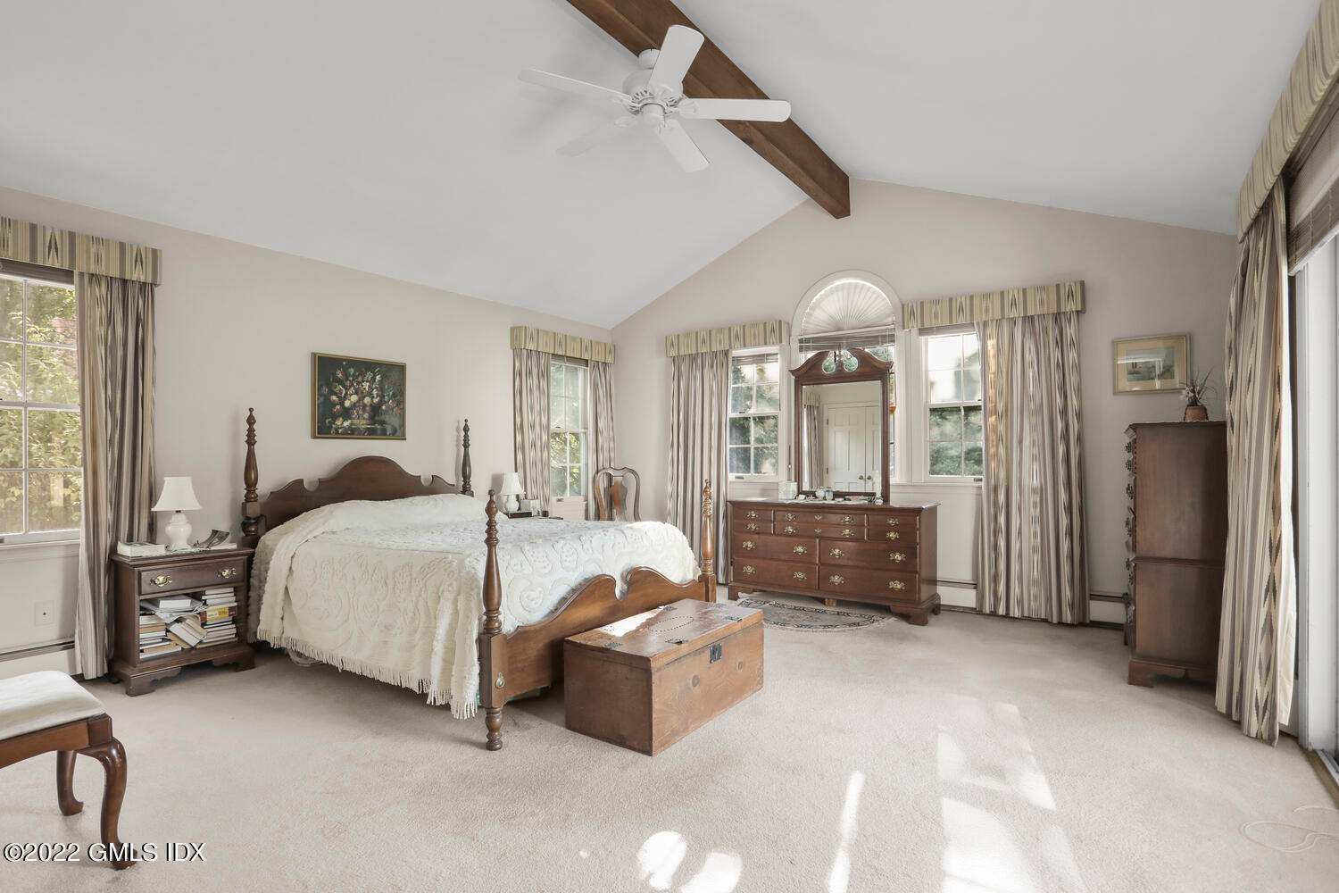 3 Wahneta Road Old Greenwich, CT 06870 - Photo 12 of 28 a spacious bedroom with a bed and ceiling fan