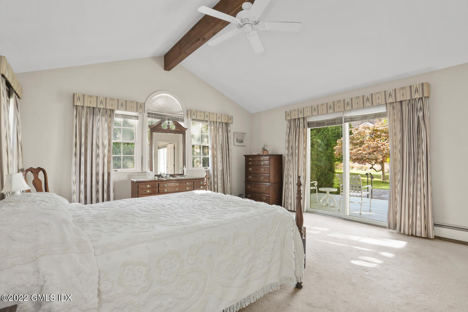 3 Wahneta Road Old Greenwich, CT 06870 - Photo 13 of 28 a large bedroom with a bed and glass door