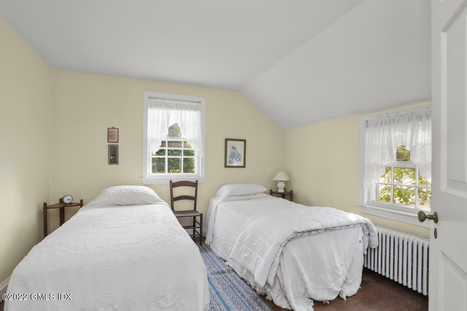 3 Wahneta Road Old Greenwich, CT 06870 - Photo 16 of 28 a bedroom with two beds and a window