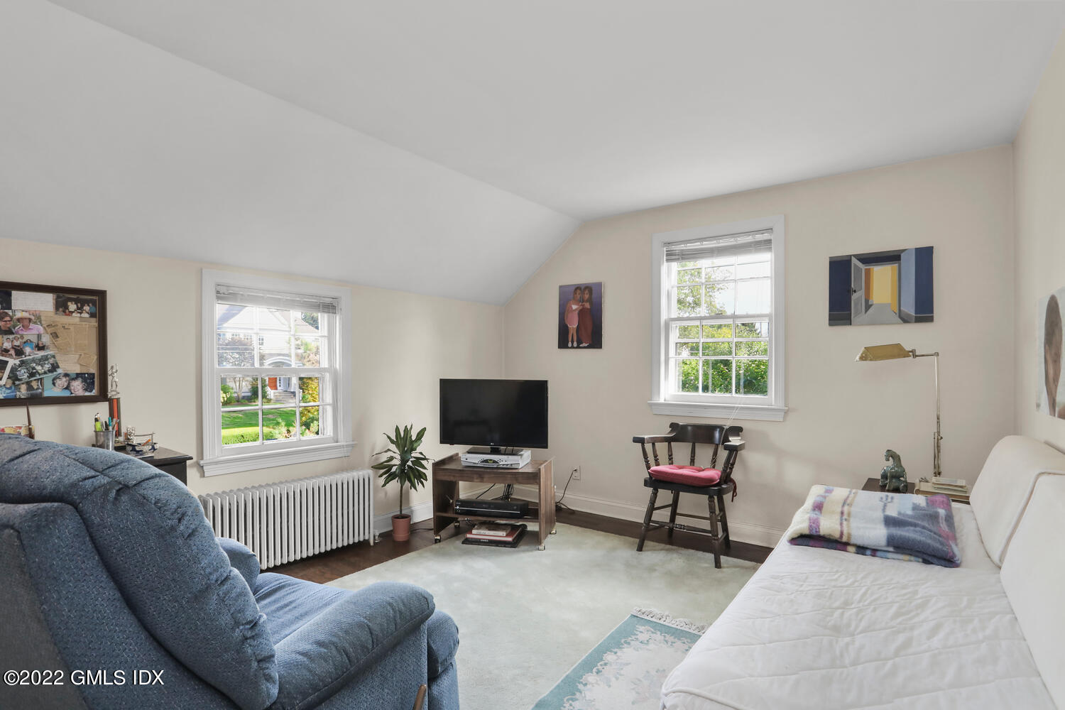 3 Wahneta Road Old Greenwich, CT 06870 - Photo 17 of 28 a living room with furniture a window and a flat screen tv