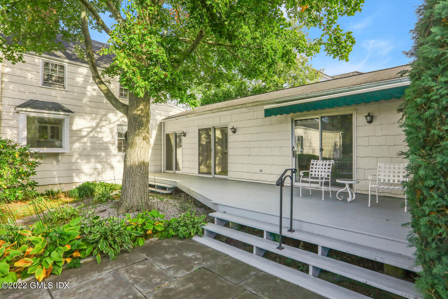 3 Wahneta Road Old Greenwich, CT 06870 - Photo 19 of 28 front view of a house with a yard