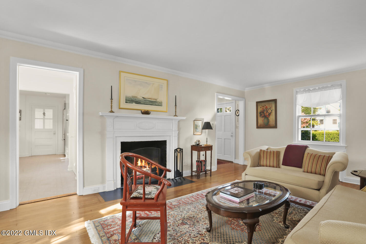3 Wahneta Road Old Greenwich, CT 06870 - Photo 3 of 28 a living room with furniture and a fireplace