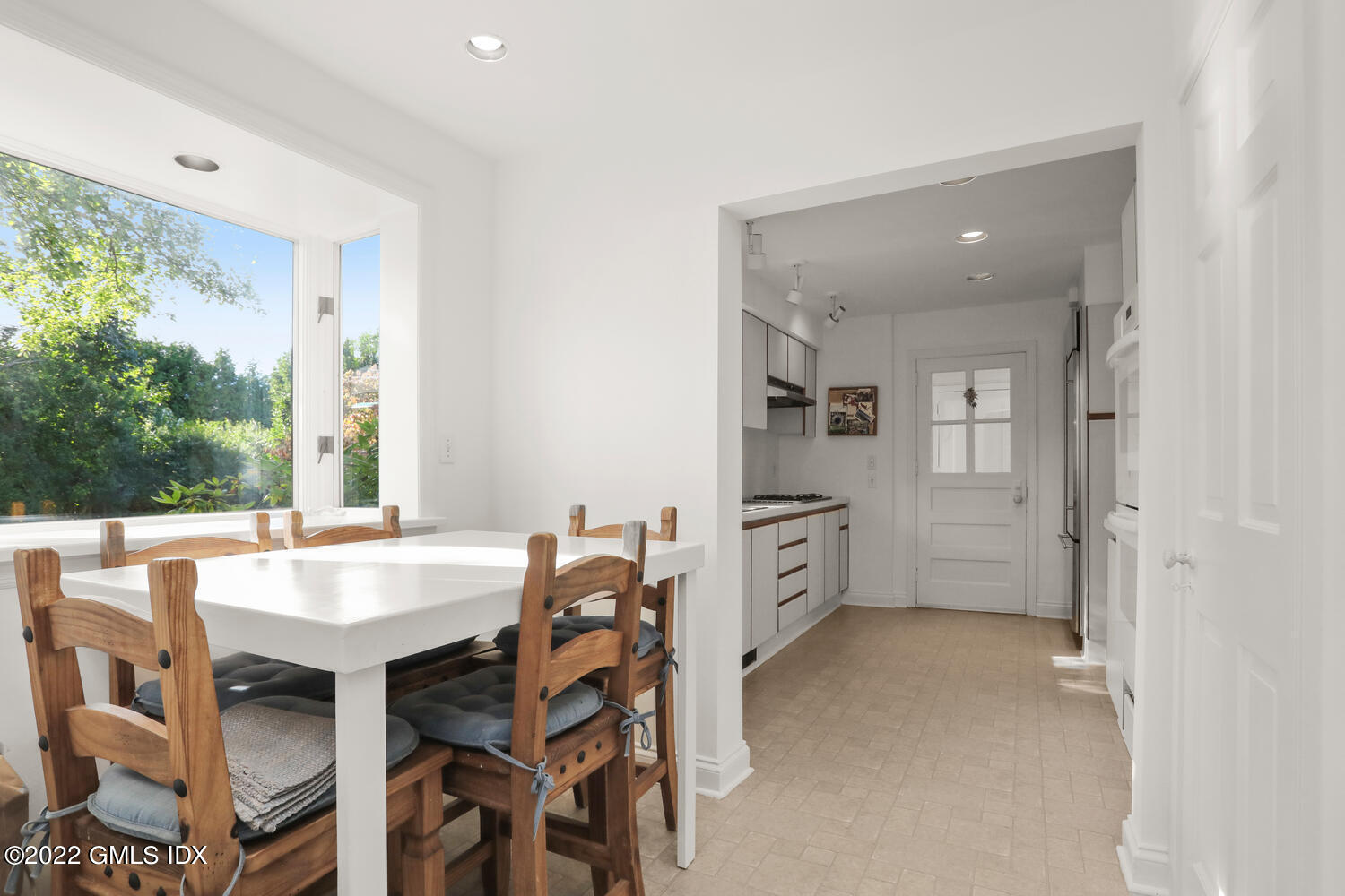 3 Wahneta Road Old Greenwich, CT 06870 - Photo 7 of 28 a view of a dining room with furniture and a window