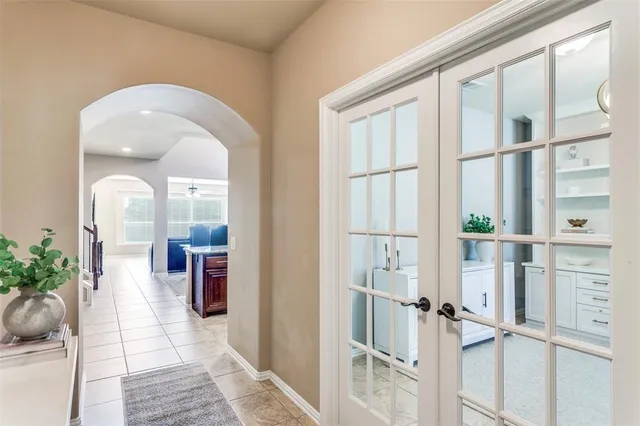 a view of front door of house with outdoor seating