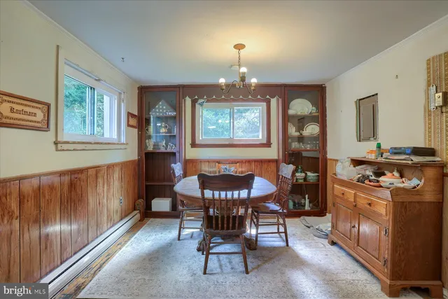 a kitchen with a refrigerator and a sink