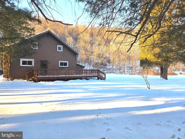 a outdoor view of a building with traffic signal lights