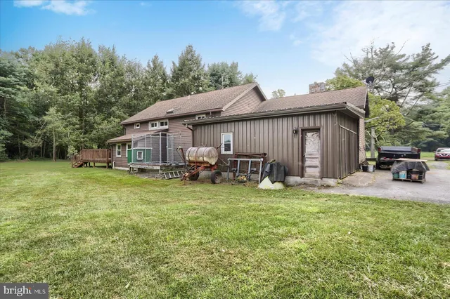 a view of a yard with an outdoor space