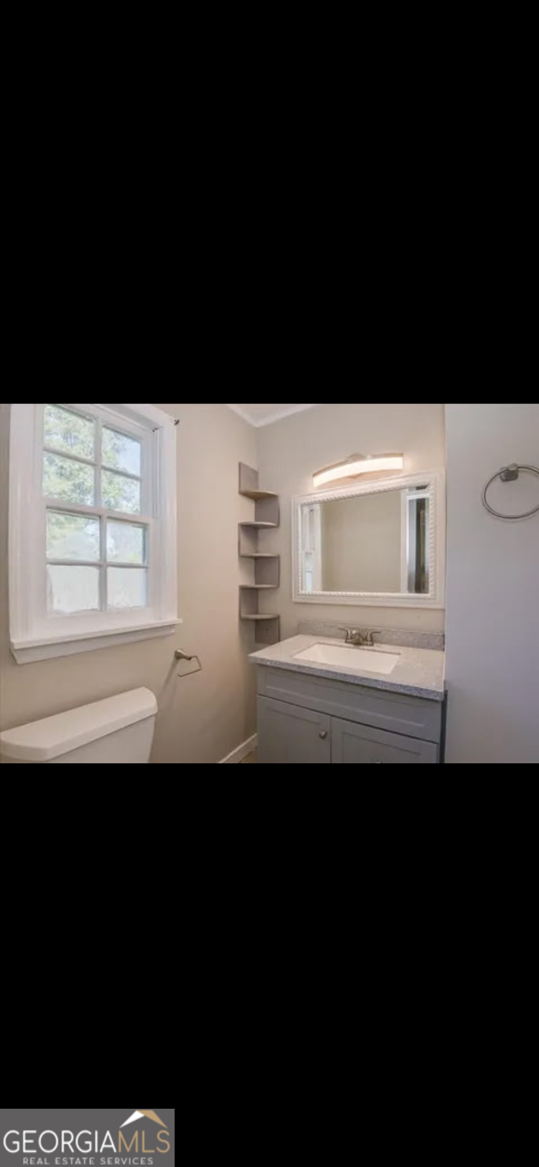 1065 Nathan Jones Road Harlem, GA 30814 - Photo 2 of 32 a view of a room with an empty space and window