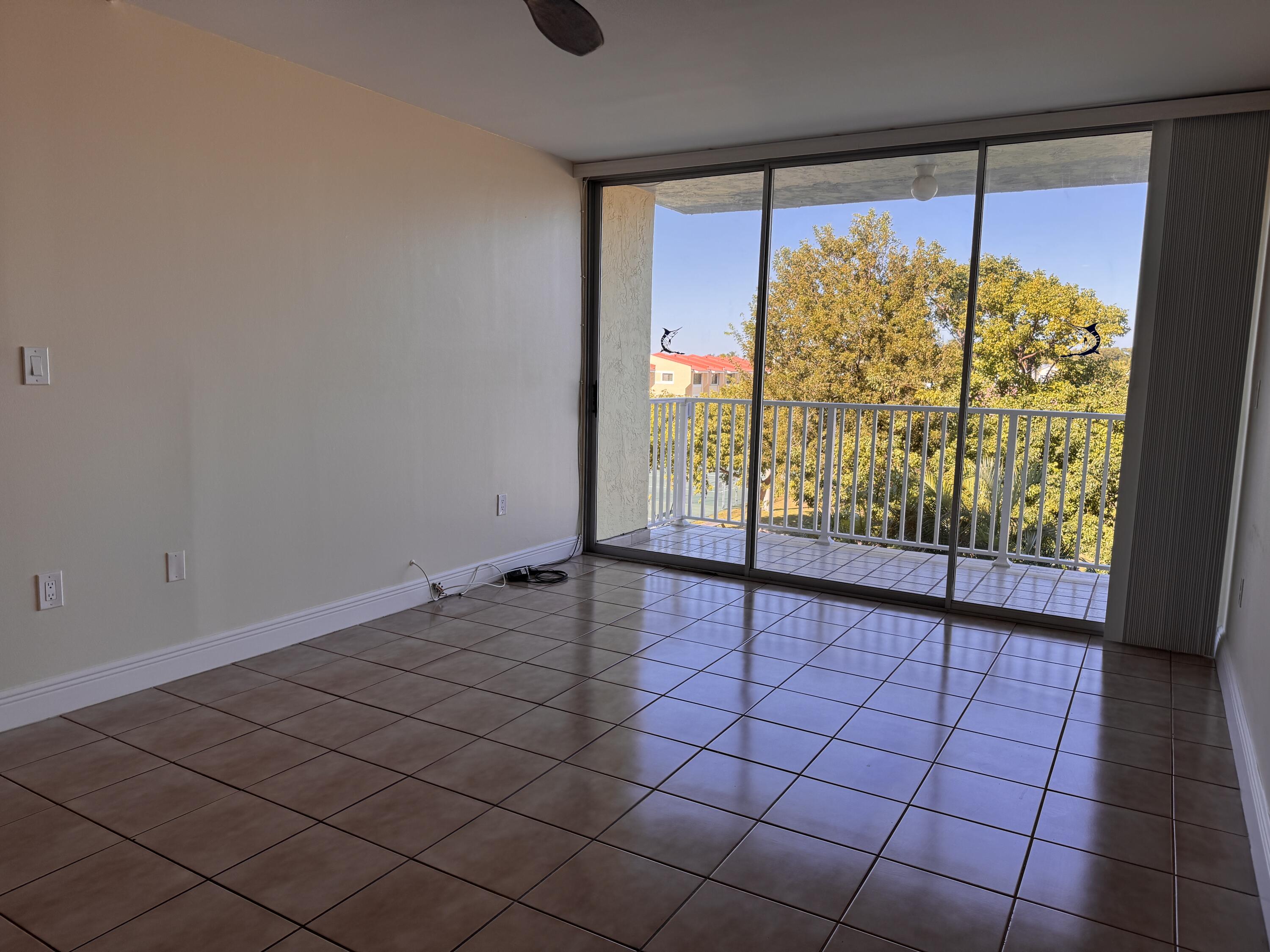 88540 Overseas Highway, Unit 203 Tavernier, FL 33070 - Photo 4 of 35 a view of a room with window