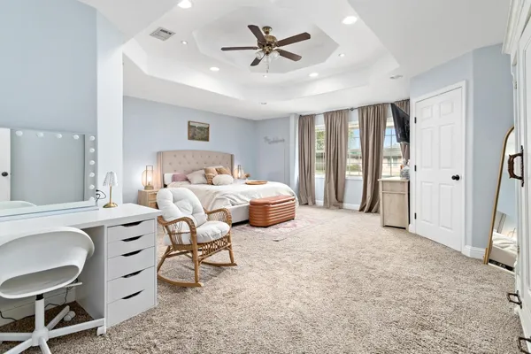 a living room with furniture and white walls
