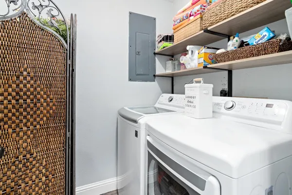 a utility room with dryer and washer