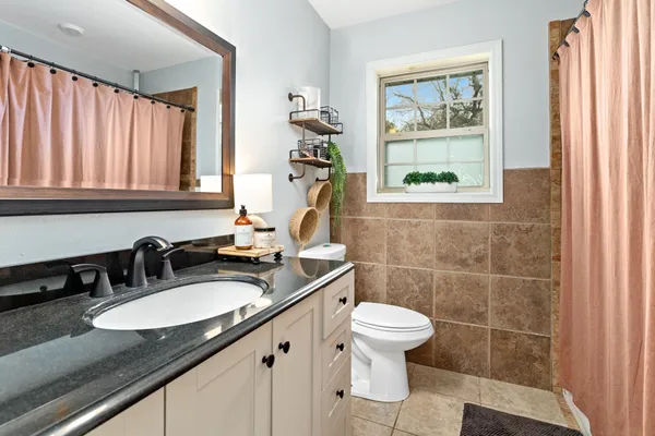 a bathroom with a bathtub
