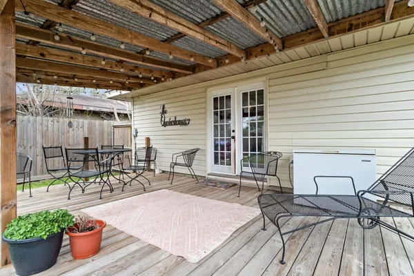 a front view of house with yard and seating area