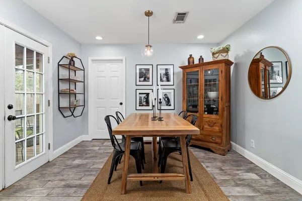 a view of a dining room with furniture