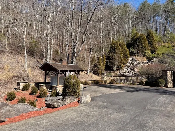 a view of a street with cars