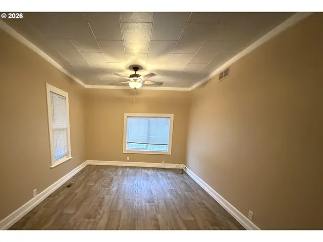 a view of a hallway with toilet