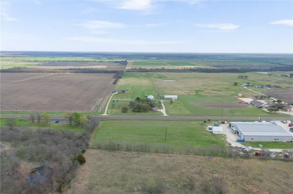 a view of a lake with a big yard