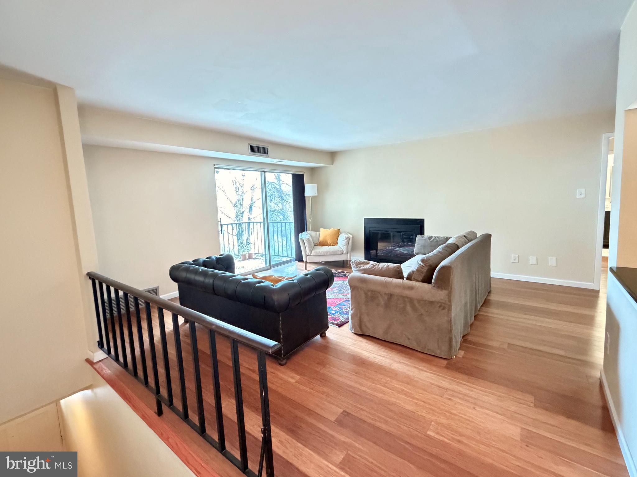 513 Old Forge Crossing, Unit 513 Wayne, PA 19087 - Photo 2 of 22 Open Living Rm w/ Sliders to Large Covered Balcony