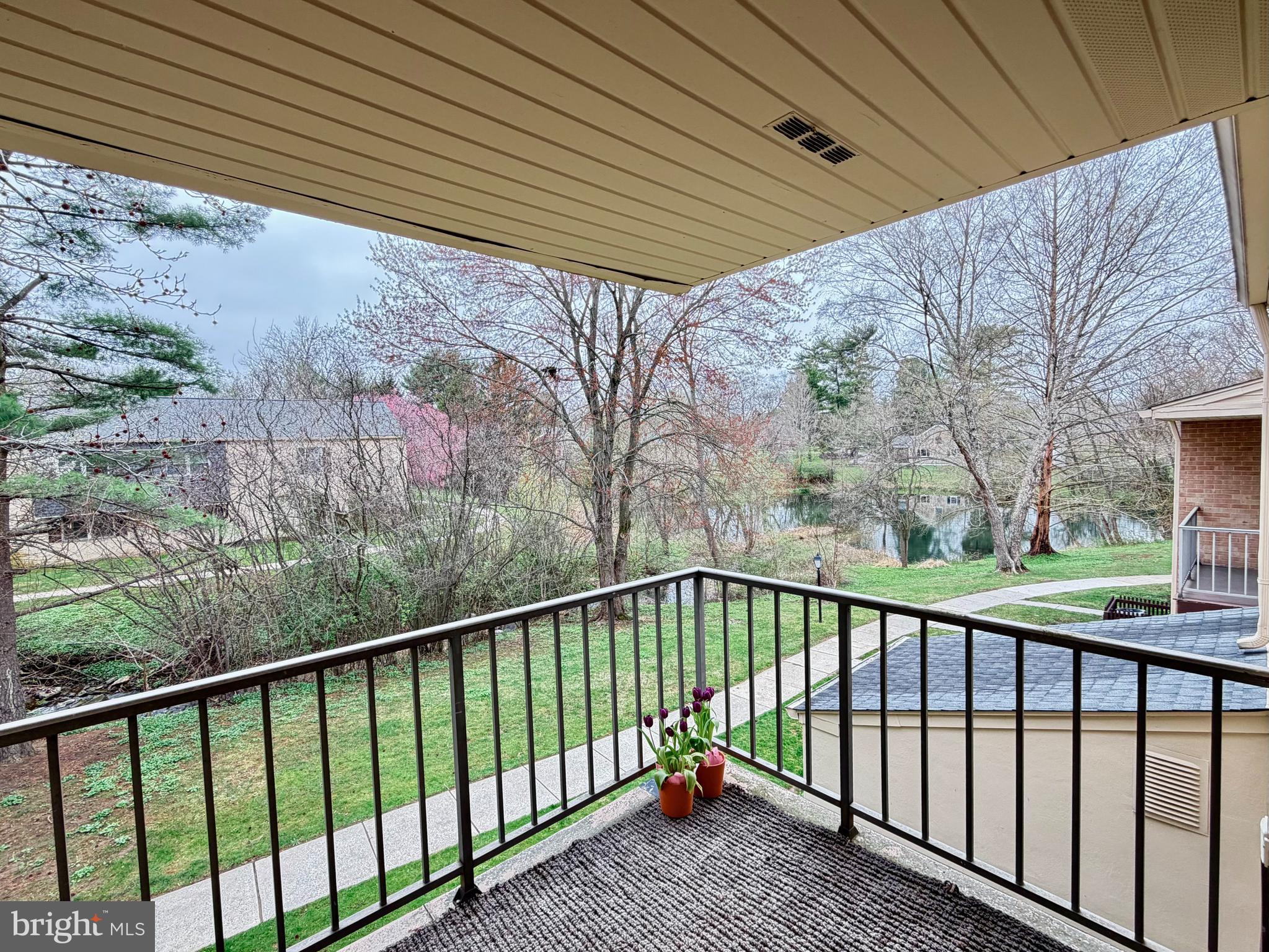 513 Old Forge Crossing, Unit 513 Wayne, PA 19087 - Photo 4 of 22 Large covered deck with views of creek & green