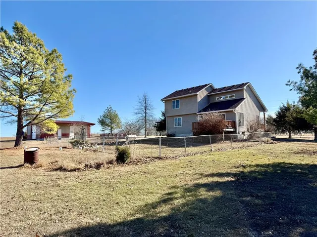 $325,000 | 350 Southeast Rattle Snake Hill, Butler, MO 64730