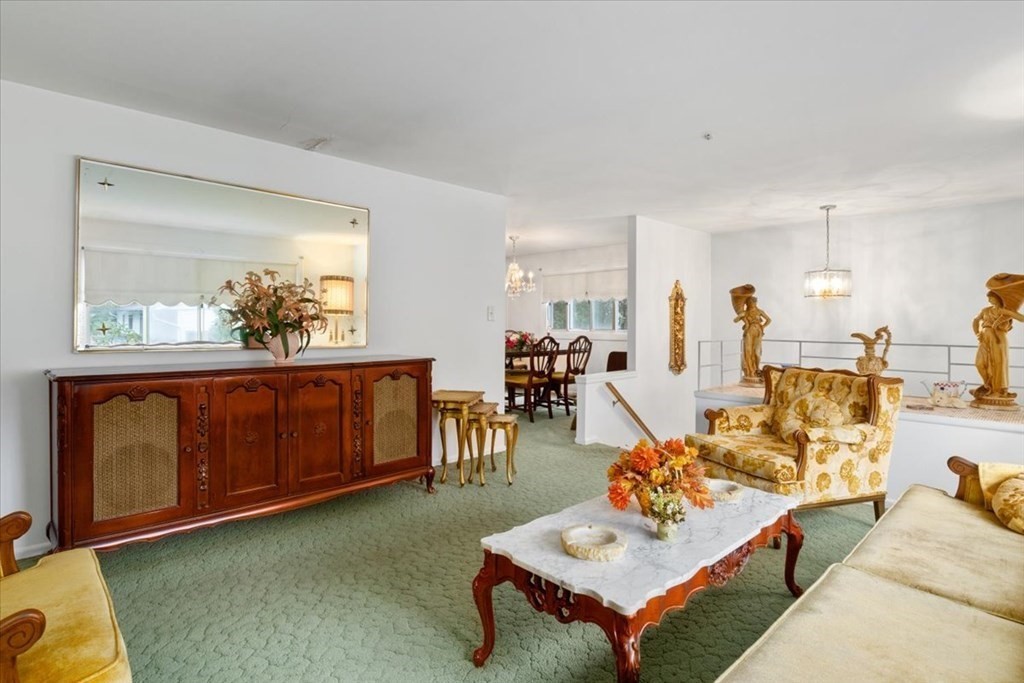 9 Belnap Road Boston, MA 02136 - Photo 8 of 35 a living room with furniture and wooden floor