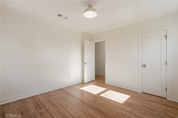 a view of a room that has a large window