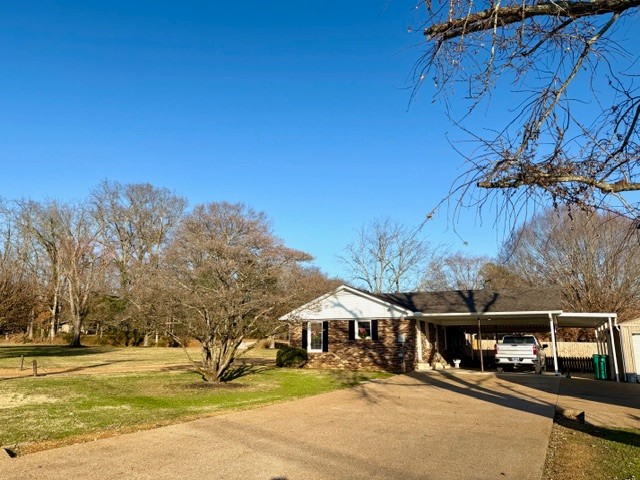 43 Liberty Road Winchester, TN 37398 - Photo 22 of 27 a swimming pool with outdoor seating and yard