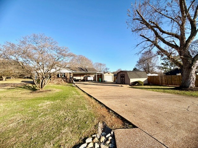 43 Liberty Road Winchester, TN 37398 - Photo 23 of 27 a street view with large trees