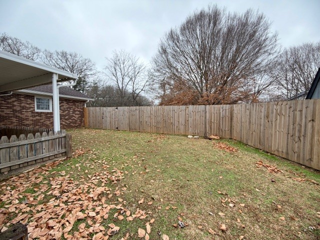 43 Liberty Road Winchester, TN 37398 - Photo 27 of 27 a view of a backyard with wooden fence