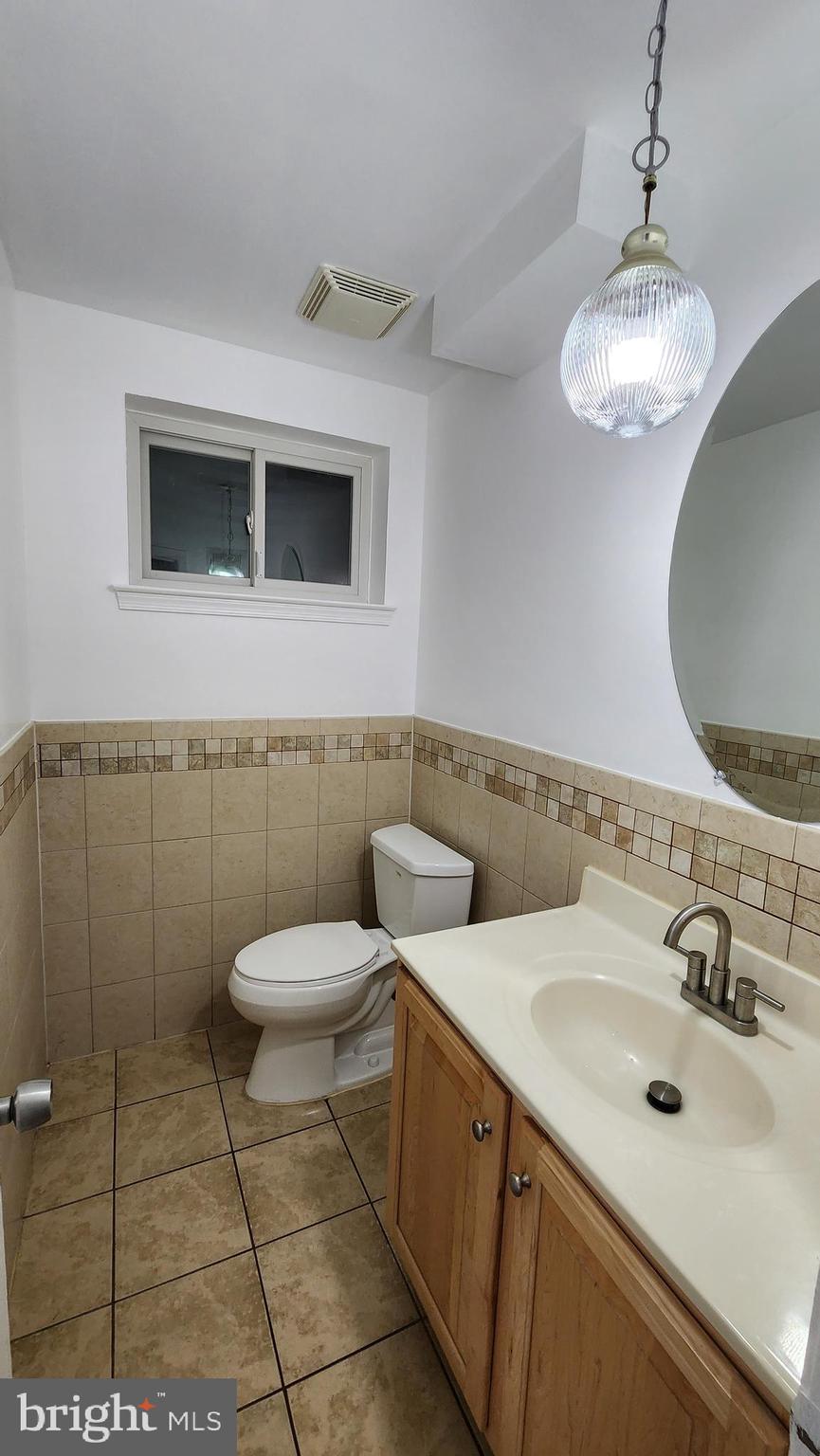 8438 Thames Street Springfield, VA 22151 - Photo 16 of 67 Lower-level half bath