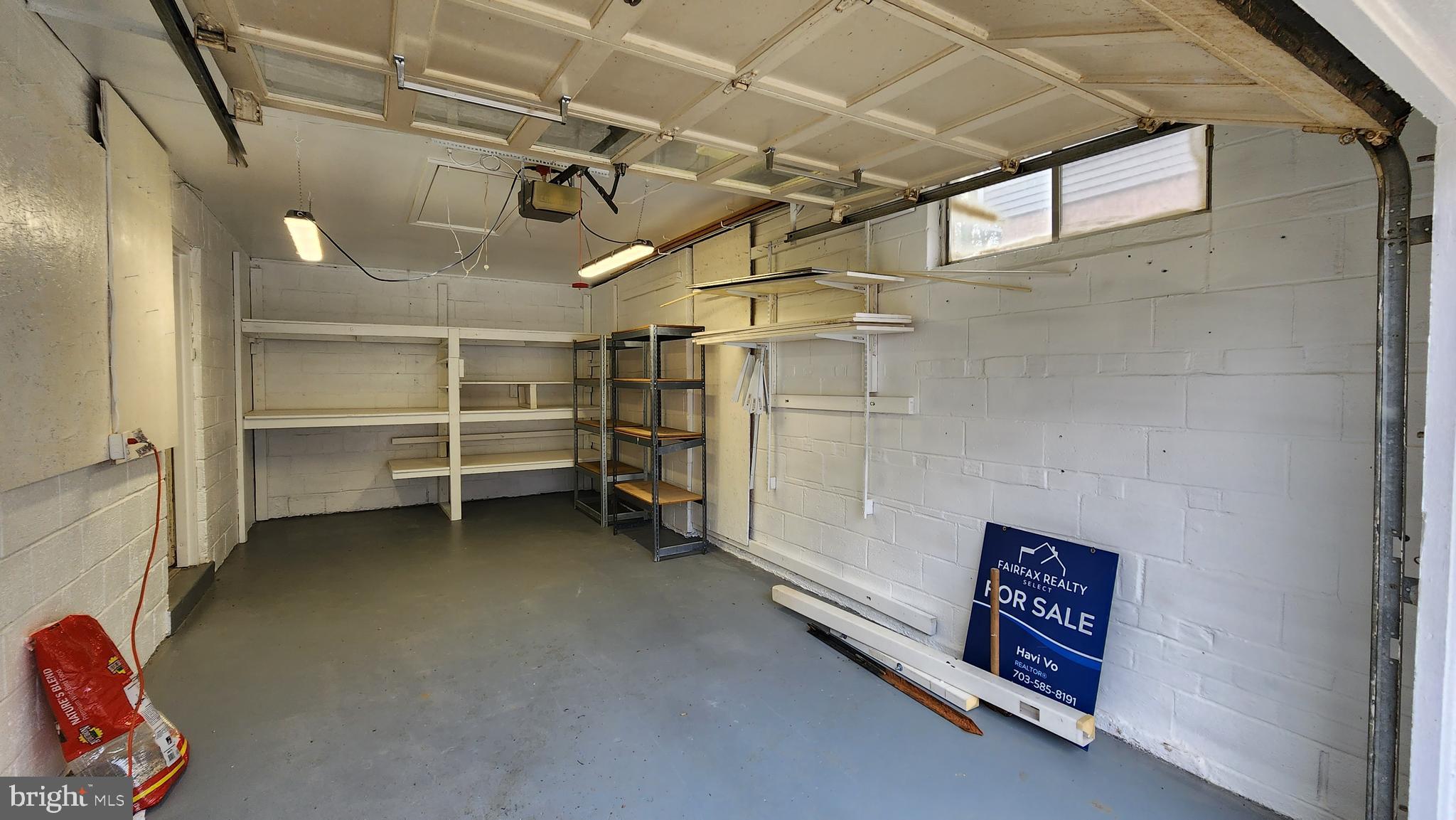 8438 Thames Street Springfield, VA 22151 - Photo 57 of 67 Garage and shelving - view 2