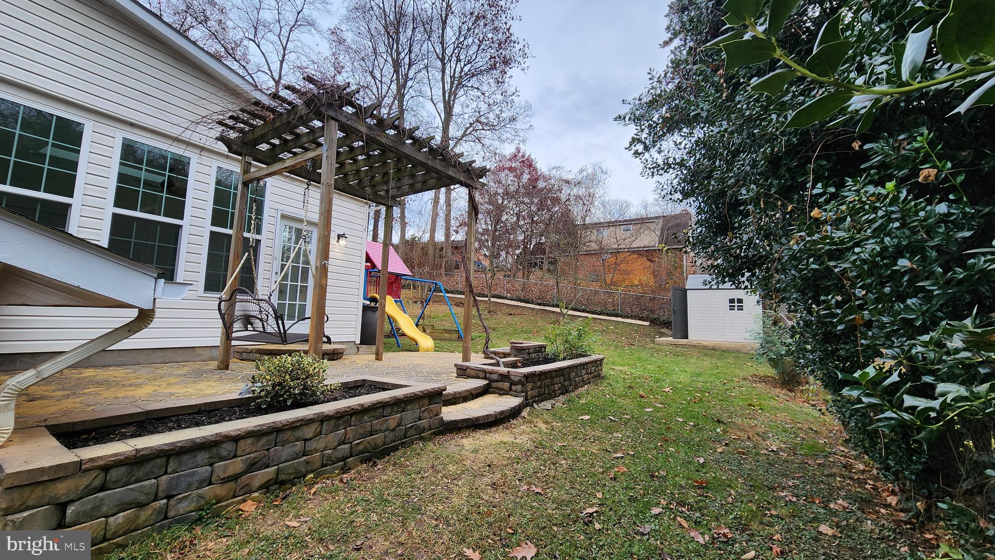 8438 Thames Street Springfield, VA 22151 - Photo 58 of 67 Patio with grapevine arbor - View 1