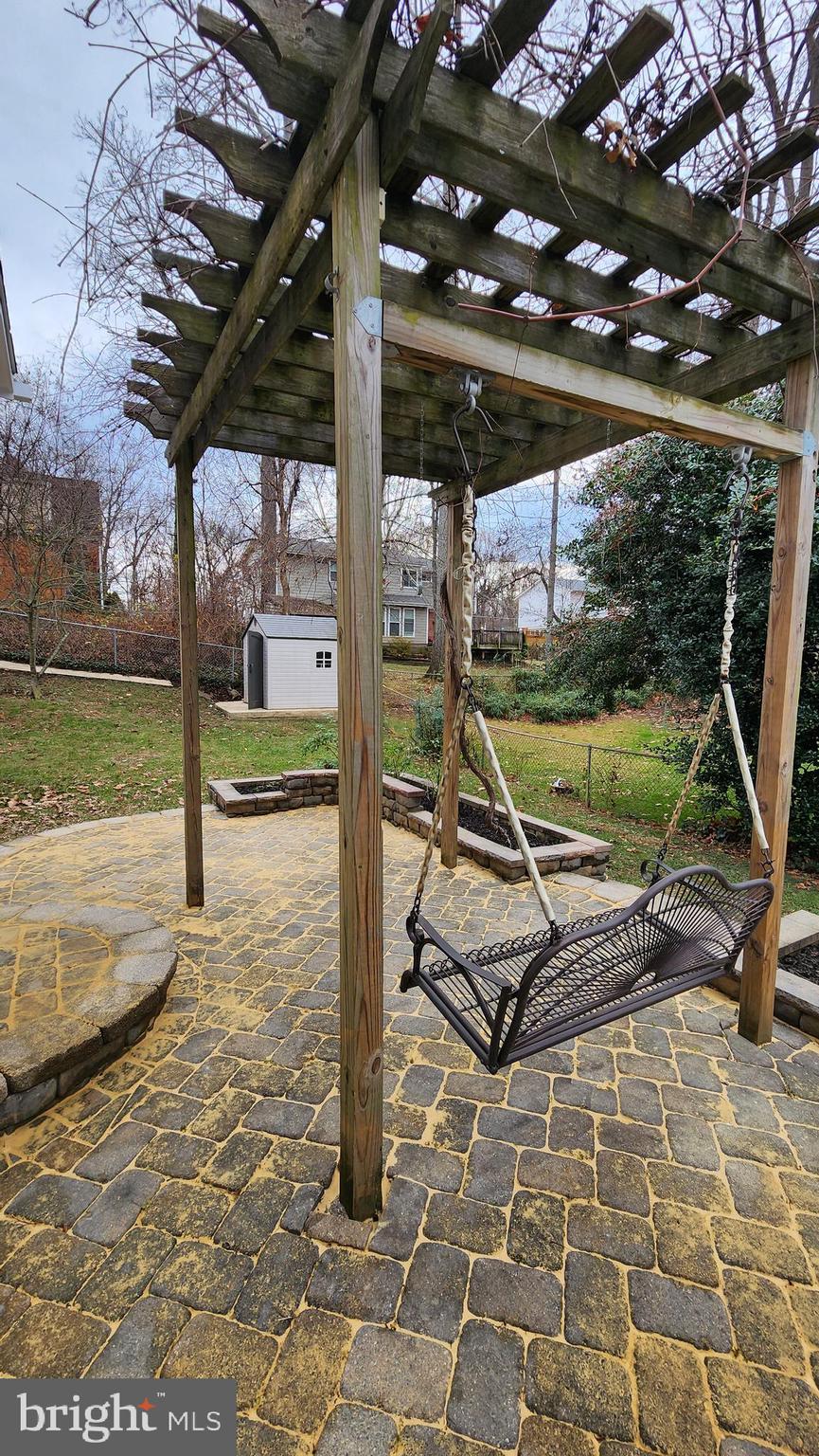 8438 Thames Street Springfield, VA 22151 - Photo 64 of 67 Patio with grapevine arbor - View 3