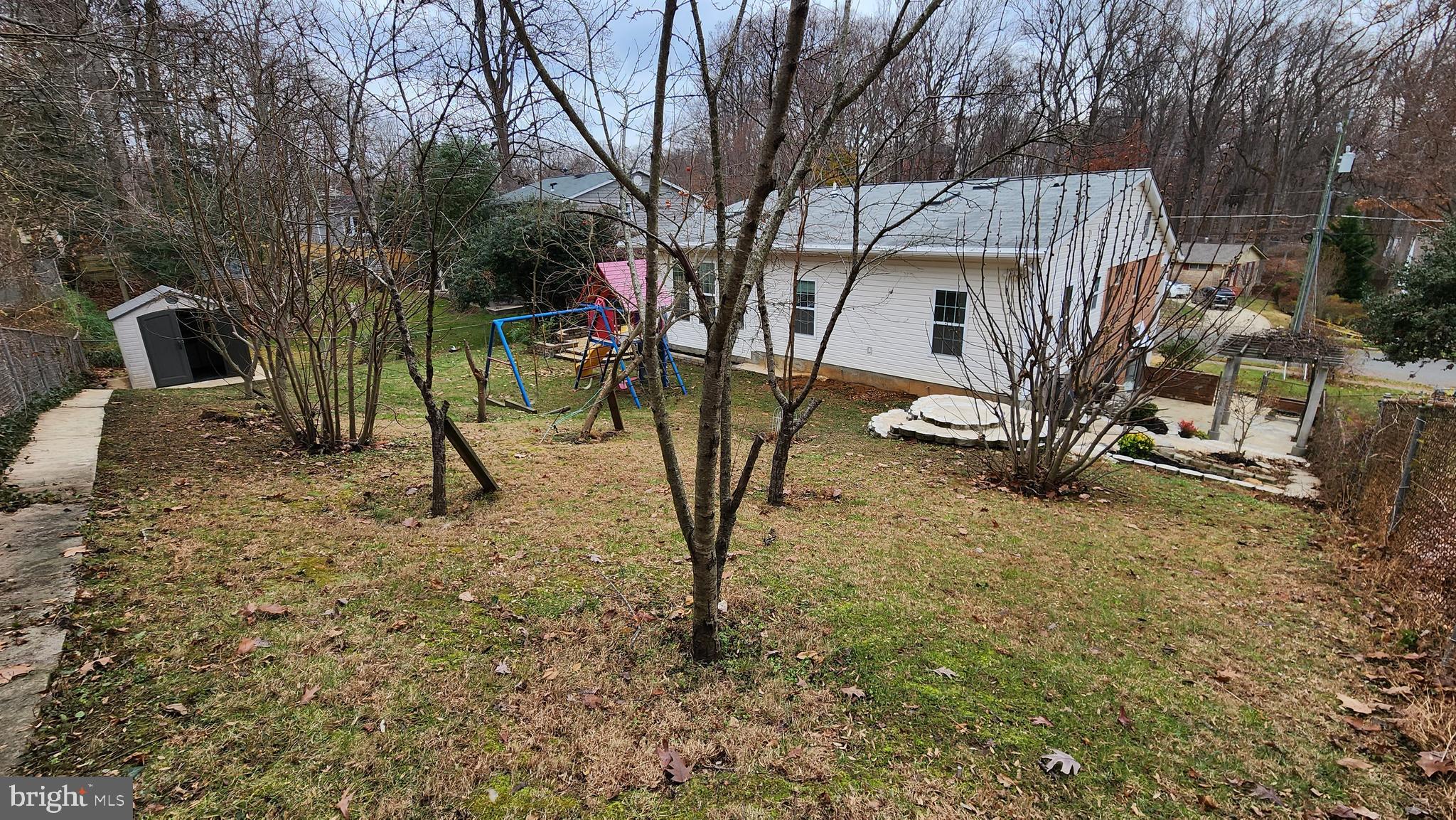 8438 Thames Street Springfield, VA 22151 - Photo 65 of 67 Backyard view - Fruit Trees