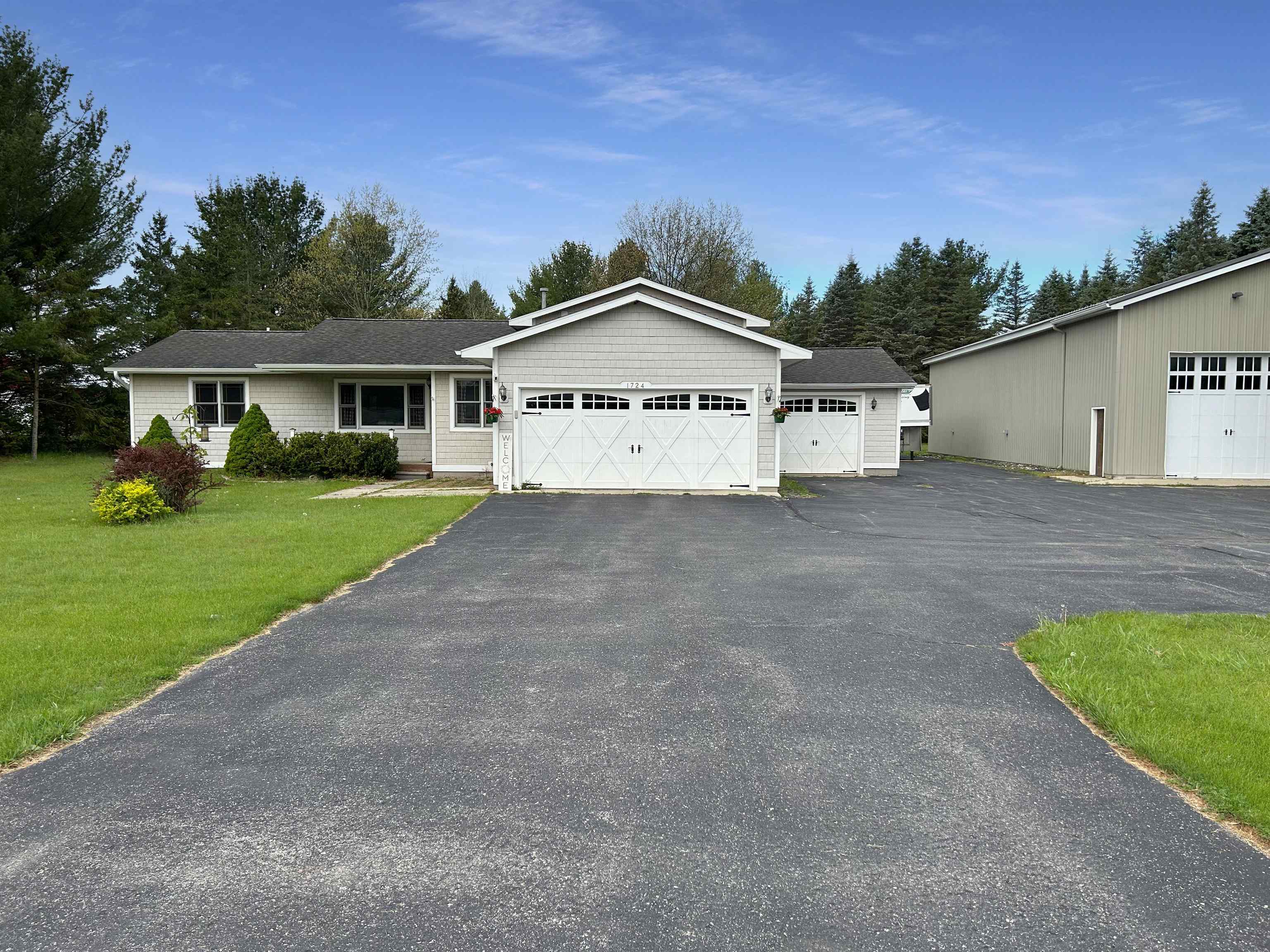 1724 Pine Tree Road Grawn, MI 49637 - Photo 1 of 37