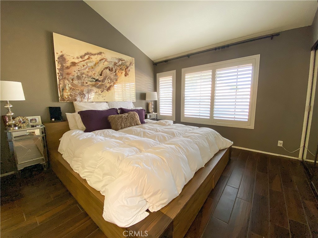 1087 Mesa Bluff Drive Costa Mesa, CA 92627 - Photo 16 of 23 a large bed sitting in a bedroom next to a window