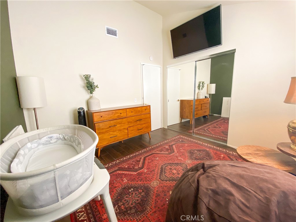 1087 Mesa Bluff Drive Costa Mesa, CA 92627 - Photo 19 of 23 a bed room with a bed and a television