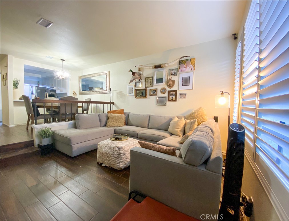 1087 Mesa Bluff Drive Costa Mesa, CA 92627 - Photo 4 of 23 a living room with furniture and a window