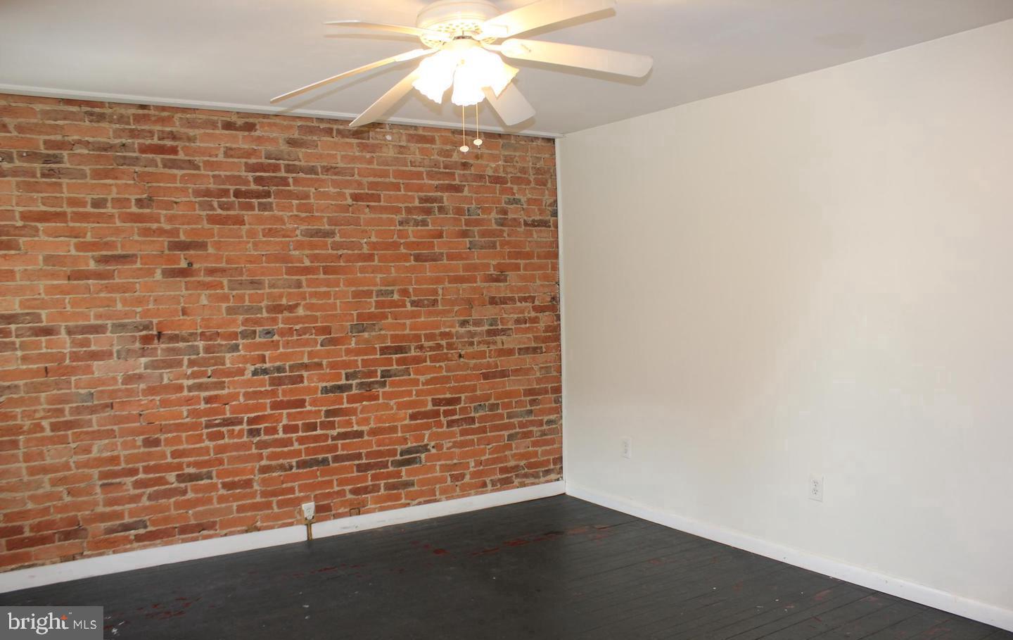 236 North Locust Street Hagerstown, MD 21740 - Photo 12 of 22 a view of empty room with a window
