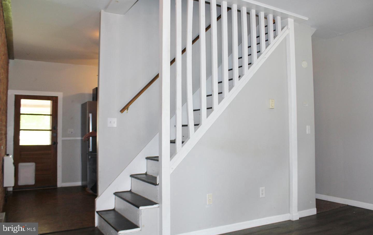 236 North Locust Street Hagerstown, MD 21740 - Photo 2 of 22 a view of entryway with wooden floor