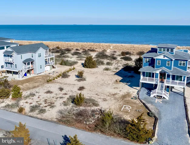 a view of ocean with a mountain
