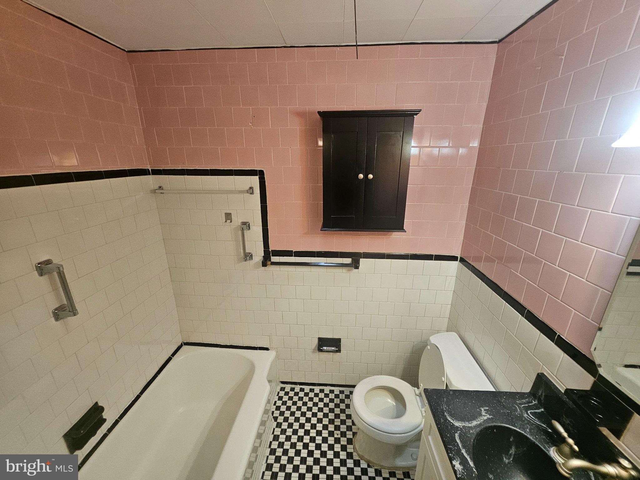 635 48th Street Baltimore, MD 21224 - Photo 11 of 14 Charming vintage bathroom with flair.