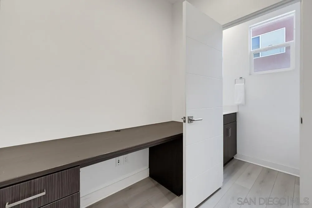 745 Shoreline Road Chula Vista, CA 91910 - Photo 20 of 57 Office nook with built-in desk, storage closet and half bath off the second-floor living area