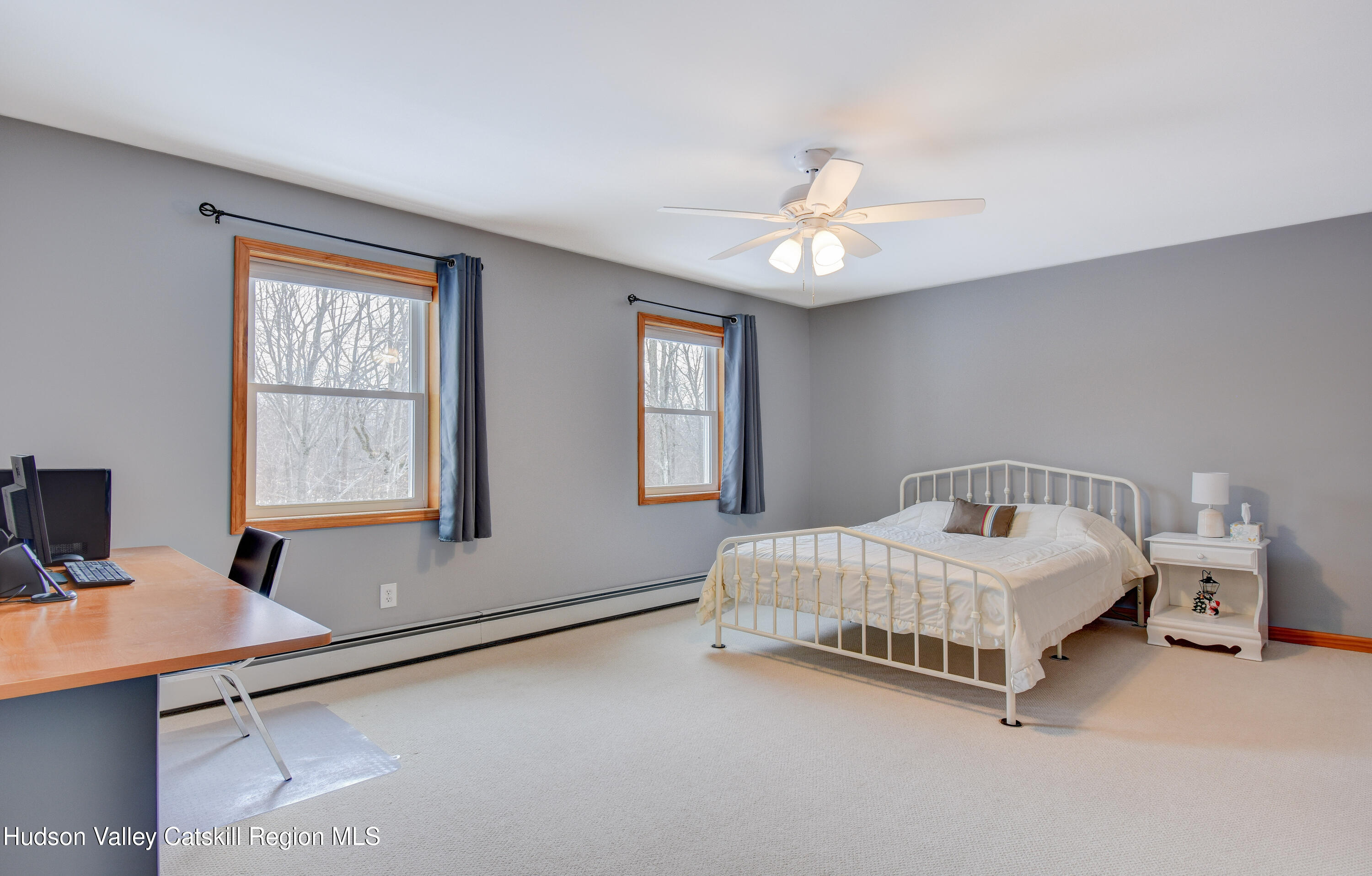 309 Quannacut Road Pine Bush, NY 12566 - Photo 15 of 43 a spacious bedroom with a bed and a window
