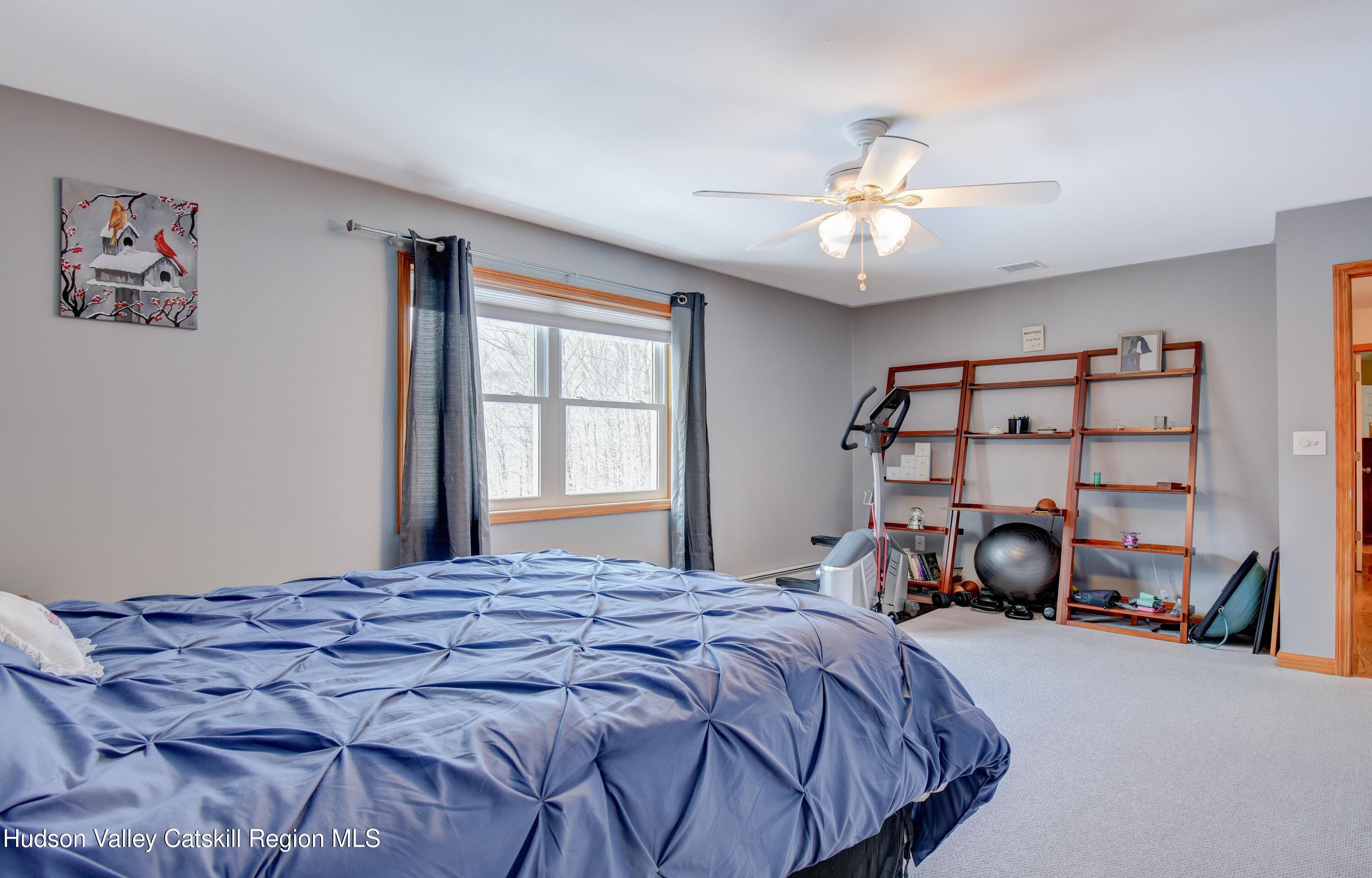 309 Quannacut Road Pine Bush, NY 12566 - Photo 16 of 43 a bedroom with a bed and a large window